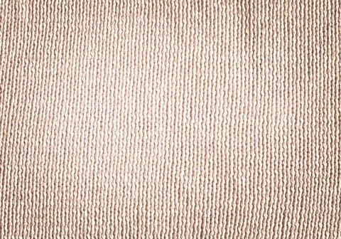 Abstract white  soft knitted pattern textured. Warm light woolen braids are k Stock Photos