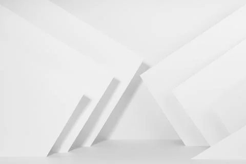 Abstract white stage with pattern of stripes, corners of paper in hard light, Stock Photos