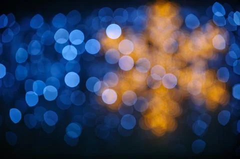 Abstract winter background with bokeh lights and snowflake Stock Photos