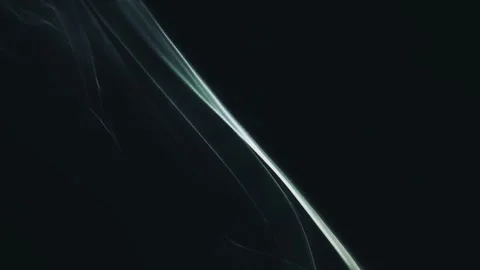 Abstract wisps of smoke gently drift against dark backdrop Stock Footage 327472526