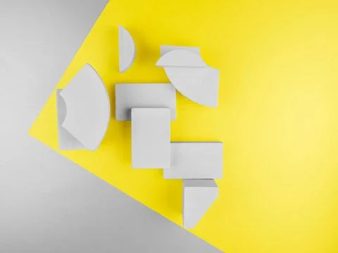 Abstract wooden geometric figures: rectangles,segment of circle,arc,yellow gray Foto stock