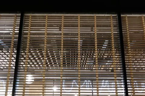 Abstract wooden horizontal parallel lines on a glass display case 스톡 사진