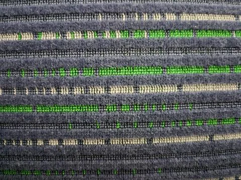 Abstract woven textile pattern with green and gray stripes Stockfoto's