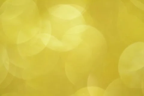 Abstract yellow background. Defocus light with bokeh. Spring, Summer Stock Photos