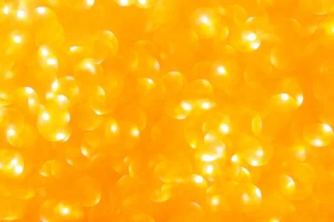 Abstract yellow background. Defocus light with bokeh Stock Photos