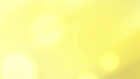 Abstract yellow bokeh background featuring shimmer Stockbeeldmateriaal 337822387