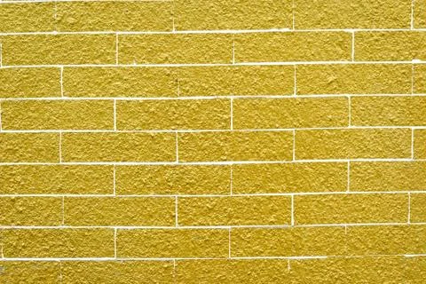Abstract yellow brick wall texture. Seamless pattern of Golden bricks wall Stock Illustration