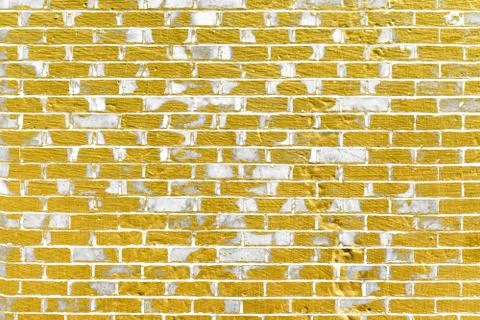 Abstract yellow brick wall texture. Pattern of Golden bricks wall background. Stock Illustration