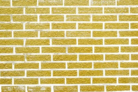 Abstract yellow brick wall texture. Seamless pattern of Golden bricks wall Stockillustratie