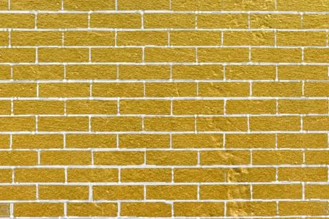 Abstract yellow brick wall texture. Pattern of Golden bricks wall background. Stock Illustration