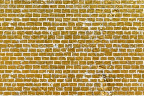 Abstract yellow brick wall texture. Pattern of Golden bricks wall background. Stock Illustration