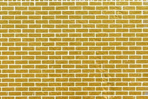 Abstract yellow brick wall texture. Pattern of Golden bricks wall background. Stock Illustration