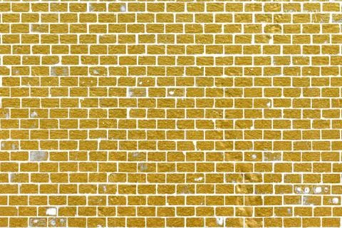 Abstract yellow brick wall texture. Pattern of Golden bricks wall background. Stock Illustration