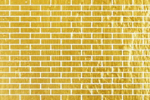 Abstract yellow brick wall texture. Pattern of Golden bricks wall background. Stock Photos