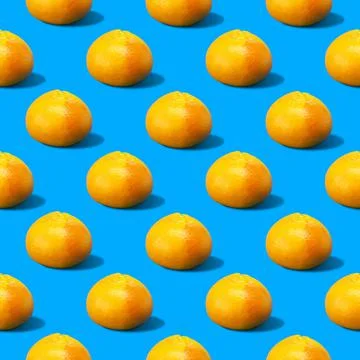 Abstract yellow grapefruits pattern on blue background Stock Photos