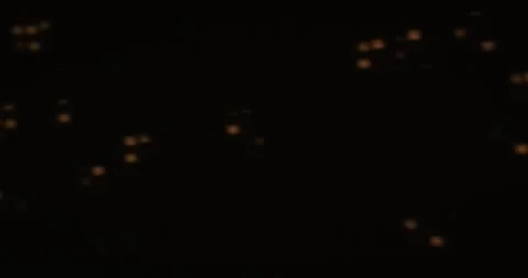 Abstract Yellow Light Patterns on Dark Background Stock Footage 328019185