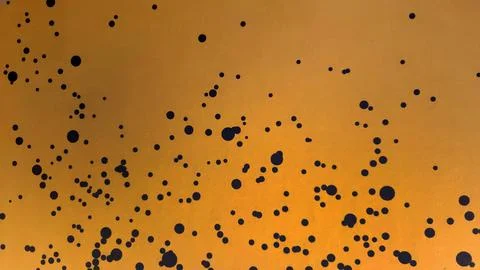 Abstract yellow with pattern black dot painted wall background Stock Photos