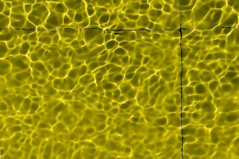 Abstract yellow pattern - view from above on sunlit shine water surface Foto stock