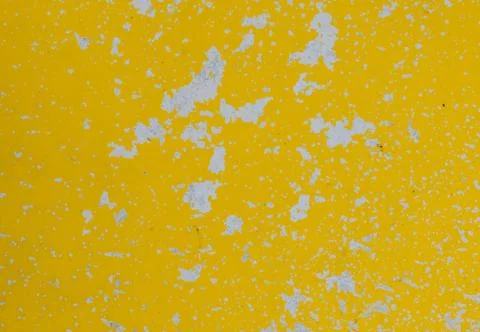 Abstract yellow texture for background. Pattern of cracks and stains. Stock Photos