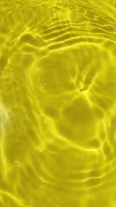 Abstract yellow water background. Psychedelic water movement. Vertical video Stock Footage 341075150