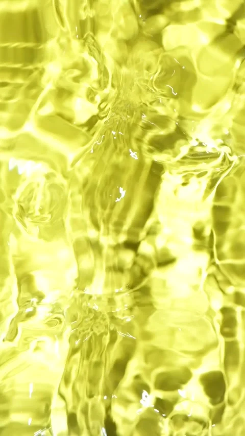 Abstract yellow water surface background with gentle waves and copy space in slo Stock Footage 345226823