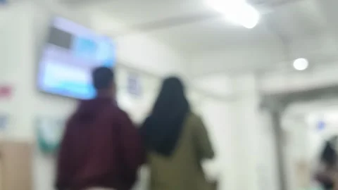 Abstracted glimpse of a waiting area, Capturing indistinct silhouettes and .. Stock Footage 303831326