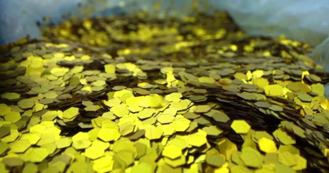 Abstraction of gold particles, falling gold particles from top to bottom into a Stock Footage 167839411