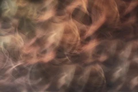 Abstraction. Horizontal brown beige background with small wavy lines and wave Foto stock