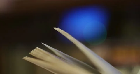 Abstraction. The man was holding an open book on a colored background. 스톡 동영상 167580418