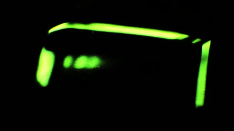 Abstraction is reflected by a quickly flickering surface, green. Flickering fast Stock Footage 104568730