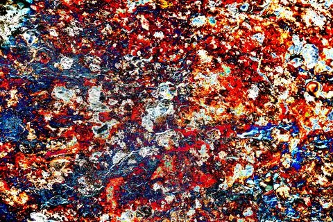 Abstraction surface of a shell rock, changed colors, colorful background Stock Photos