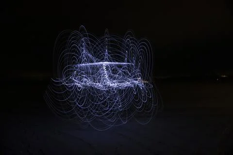 Abstraction with white light on a dark background Stock Photos