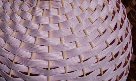 Abstractl straw weave background made of interlaced lines of straw Illustrazione stock