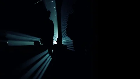 Abstracts laser light show with silhouettes of people Stock Footage 73334607