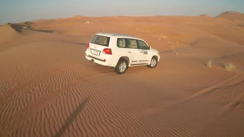 Abu Dhabi desert sand wave with car Video stock 128933906