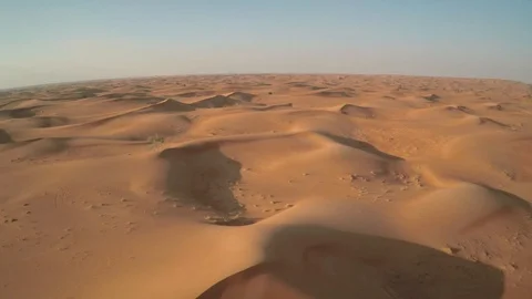 Abu Dhabi desert sand wave with sunset Stock Footage 128937992