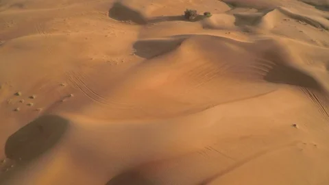 Abu Dhabi desert sand wave with sunset Stock Footage 128938874