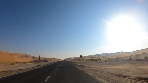 Abu Dhabi empty desolate desert road, Car Hyper-lapse driver POV shot Stock Footage 144362383