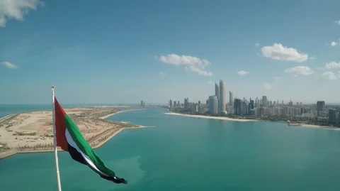 Abu Dhabi flag with aerial shooting Stock Footage 128938208