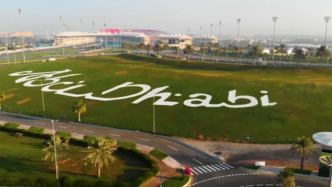 Abu Dhabi Name On Park Drone Shot Stock Footage 129457733