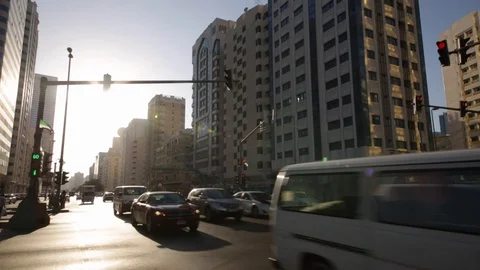 Abu Dhabi road and traffic with tourist and local people Stock Footage 128933313