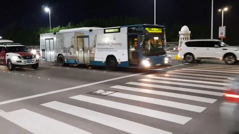 Abu Dhabi street and traffic night time Stock Footage 128649639
