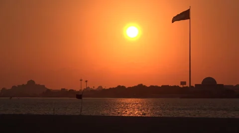 Abu Dhabi, sunset, flagpole, beach, Corniche, Middle East Video stock 49003219