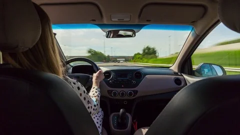 Abu dhabi traffic road trip women driver backside panorama 4k time lapse uae Stock Footage 74879676