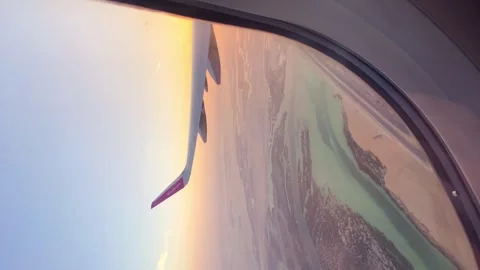 Abu Dhabi, UAE - 10th june, 2024: Hazy airplane wing view sunny cinematic p.. Stock Footage 277277049