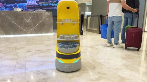Abu Dhabi, UAE - 25th april, 2025: Robot Serves Water at Abu Dhabi Airport .. Video stock 308648012