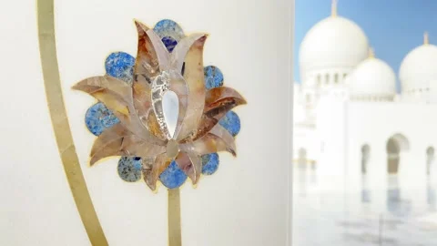 Abu dhabi, UAE - 3rd october, 2022: close up flowers on columns art exterio.. Stock Footage 229576183