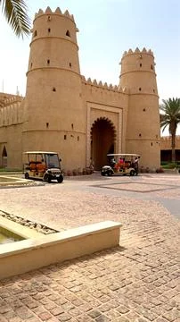 Abu Dhabi, UAE - August 5, 2024: Driving up to hotel entrance visitors see Stock Photos