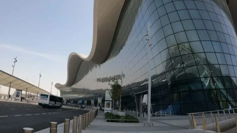 Abu Dhabi, UAE - January 8, 2025 - exterior view of Abu Dhabi Airport Stock Footage 302286961