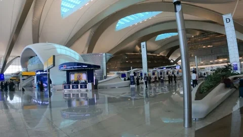 Abu Dhabi, UAE - January 8, 2025 - the check-in area of Abu Dhabi Airport Stock Footage 302286963
